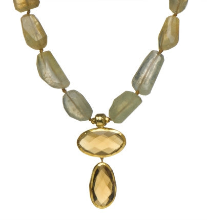 <P dir=ltr class=Body>Necklace of Prehnite nuggets with two large Whisky Quartz drops wrapped with 24k gold 20" Long or upon request Whisky Quartz drops may vary in shape and size</P>