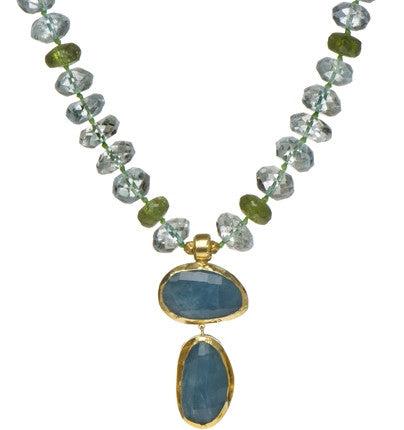 <P dir=ltr class=Body>Necklace of Aquamarine and Peridot rondelles with two&nbsp; Aquamarine Drops wrapped with 24K Gold 20" Long or upon request Aquamarine Drops may vary in shape and size</P>