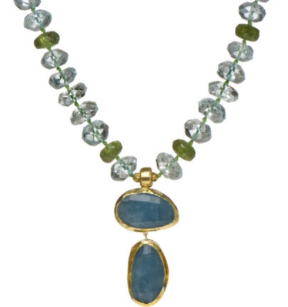 <P dir=ltr class=Body>Necklace of Aquamarine and Peridot rondelles with two&nbsp; Aquamarine Drops wrapped with 24K Gold 20" Long or upon request Aquamarine Drops may vary in shape and size</P>