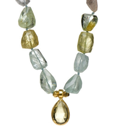 <P dir=ltr class=Body>Necklace of Multi color Aquamarine nuggets with a Pear shaped drop of Lemon Quartz wrapped with 24K Gold 19" Long or upon request</P>