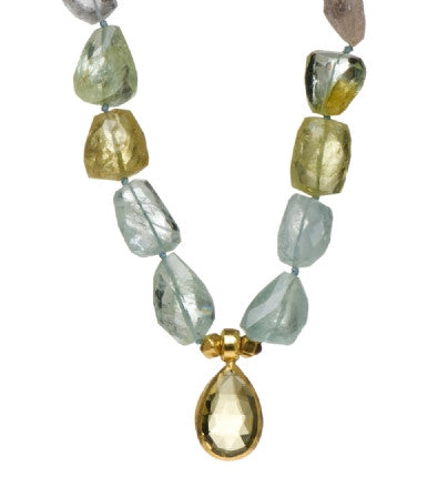 <P dir=ltr class=Body>Necklace of Multi color Aquamarine nuggets with a Pear shaped drop of Lemon Quartz wrapped with 24K Gold 19" Long or upon request</P>