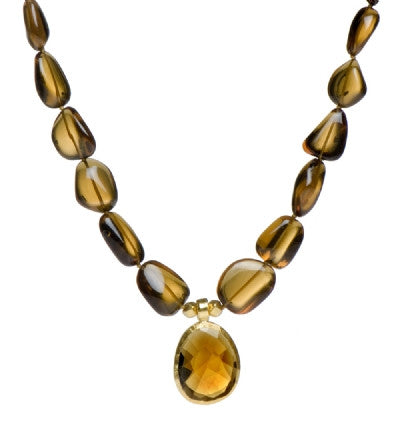 <P dir=ltr class=Body>Smooth Smoky Topaz Nugget Necklace with a Cognac Quartz Center wrapped in 24K Gold. Cognac Quartz center may Vary in Shape and Size 18" Long or upon request</P>