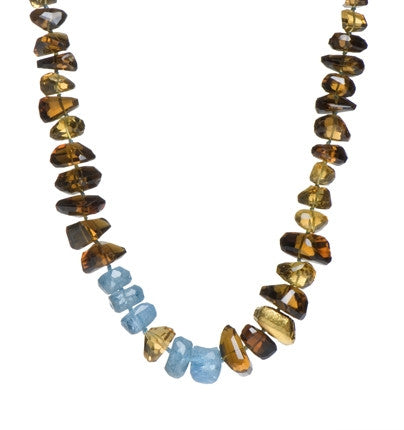 <P dir=ltr class=Body>Necklace of Cognac Quartz, Smoky Topaz and Aquamarine with one stone wrapped in 24K Gold 18" Long or upon request</P>