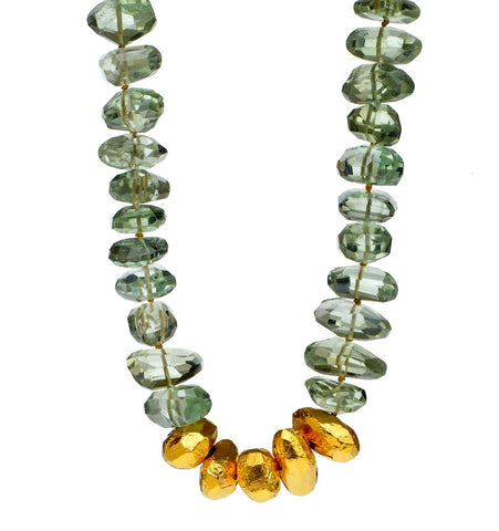 <SPAN style="COLOR: #644f21">Necklace of Green Amethyst with five stones wrapped with 24K Gold 18" Long or upon request <P dir=ltr class=Body></P>