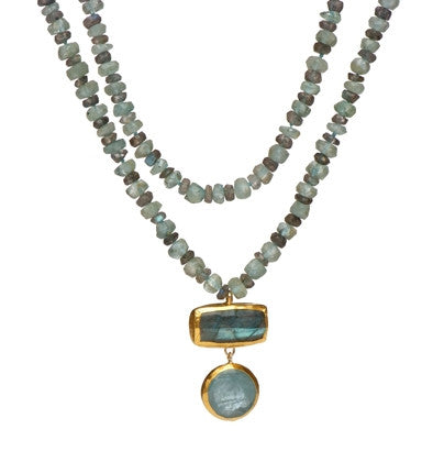 <P dir=ltr class=Body>Two strand Necklace of Aquamarine and Labradorite with Double drops of rectangular Labradorite and round Aquamarine, both wrapped with 24K Gold 19" Long or upon request</P>