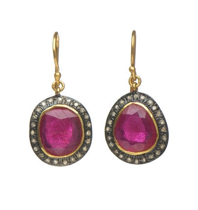 <P dir=ltr class=Body>Earrings of Large Pink Tourmalines encircled with tiny&nbsp;Diamonds and set on 18K Solid Gold Hang 32mm Width 15mm</P>