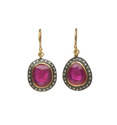 <P dir=ltr class=Body>Earrings of Large Pink Tourmalines encircled with tiny&nbsp;Diamonds and set on 18K Solid Gold Hang 32mm Width 15mm</P>