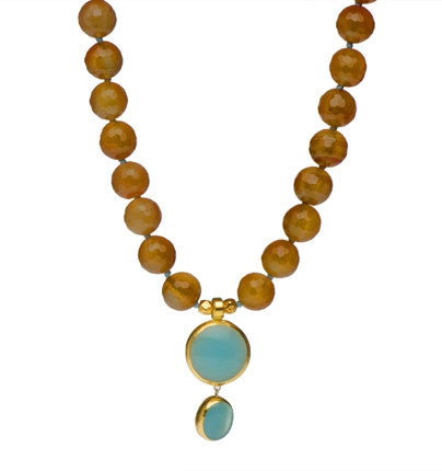 <P dir=ltr class=Body>Round Carnelian necklace with 2 Large Peruvian Chalcedony stones wrapped with 24k gold 18" Long</P>