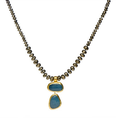 <P dir=ltr class=Body>Pyrite Necklace with two drops of uneven shaped Aquamarines wrapped in 24K Gold 18" Long or upon request Shape and size of both Aquamarine drops may vary</P>