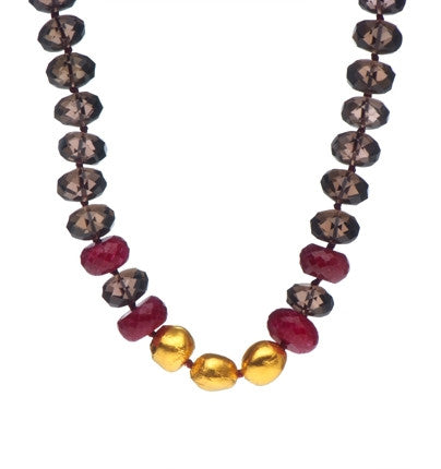 <P dir=ltr class=Body>Large Smoky Topaz and Ruby Necklace with three oval Nuggets wrapped with 24k gold 18" Long or upon request</P>