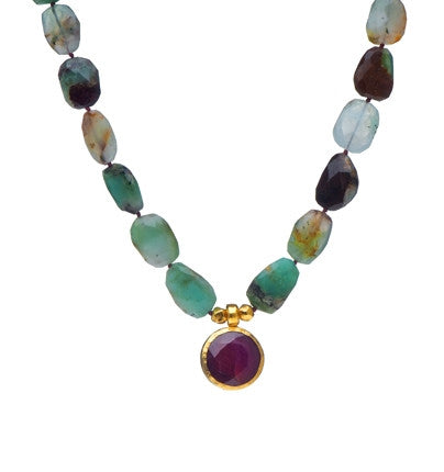 <P dir=ltr class=Body>Necklace of oval faceted Chrysoprase and a Large drop of Ruby(corundum) wrapped with 24K Gold 18" Long or upon request</P>