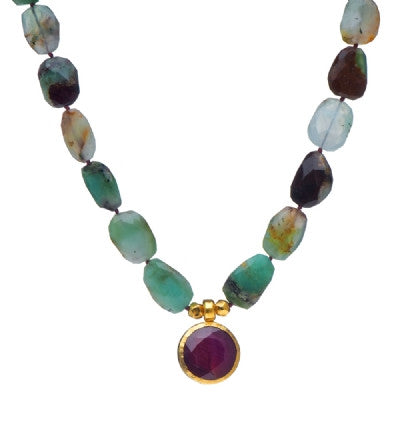 <P dir=ltr class=Body>Necklace of oval faceted Chrysoprase and a Large drop of Ruby(corundum) wrapped with 24K Gold 18" Long or upon request</P>