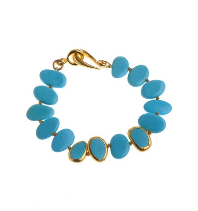 <P dir=ltr class=Body>Bracelet of Turquoise with three stones wrapped with 24K Gold 7.5" Long or upon request</P>