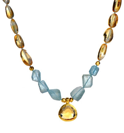 <P dir=ltr class=Body>Citrine and Aquamarine Necklace with a drop of Citrine wrapped in 24K Gold 18" Long or upon request</P>