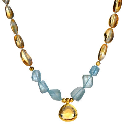 <P dir=ltr class=Body>Citrine and Aquamarine Necklace with a drop of Citrine wrapped in 24K Gold 18" Long or upon request</P>