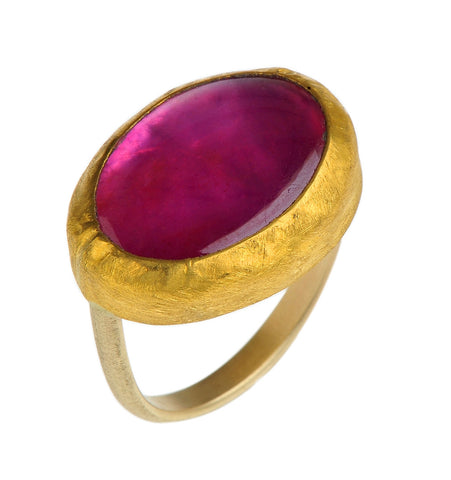 <P dir=ltr class=Body>Oval Ruby Ring wrapped with 24K Gold on Gold Band </P> <P dir=ltr class=Body>Measurments of stone is&nbsp;16 x 12mm Available size 7 Only! </P>