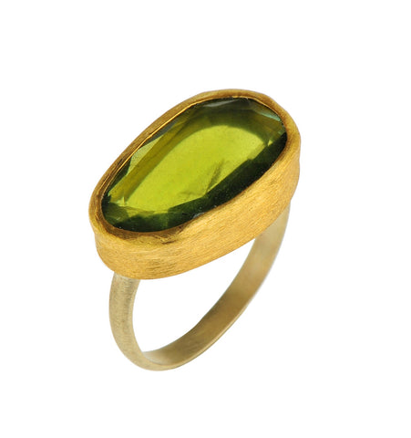 <P dir=ltr class=Body>Uneven Shaped Green Tourmaline Ring wrapped with 24K Gold on Gold Band </P> <P dir=ltr class=Body>Measurments of stone is&nbsp;20 x 11mm Available any size! Shape color and size of Tourmaline may vary</P>