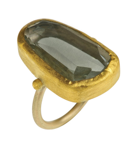 <P dir=ltr class=Body>Uneven Shaped Long Oval Green Amethyst Ring wrapped with 24K Gold on Gold Band </P> <P dir=ltr class=Body>Measurments of stone is 15 x 25mm Available any size! Shape color and size of Amethyst may very </P>