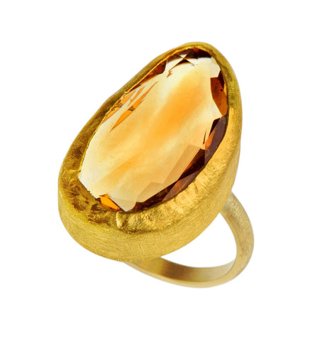 <P class=Body dir=ltr>Uneven Shaped Long Oval Citrine Ring wrapped with 24K Gold on Gold Band </P> <P class=Body dir=ltr>Measurments of stone is 15 x 25mm Available any size! Shape and size of Citrine may vary</P>