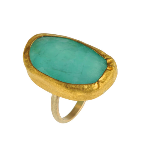 <P dir=ltr class=Body>Uneven Shaped Long Oval Emerald Ring wrapped with 24K Gold on Gold Band </P> <P dir=ltr class=Body>Measurments of stone is 18 x 28mm Available any size! Shape and size of Emerald may vary</P>