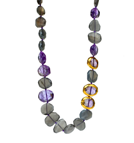 <P dir=ltr class=Body>Gray Moonstone and Amethyst Necklace and three Amethyst stones wrapped with 24K Gold 18" Long or upon request &nbsp;</P>