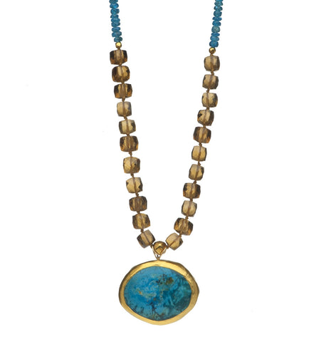 <P dir=ltr class=Body>Necklace of Apatite and Cognac Quartz with an Oval Opal drop, wrapped with 24K Gold 18" Long or upon request Measurments of Drop approx 28mm long X 35mm wide Size and Shape of Opal may vary!</P>