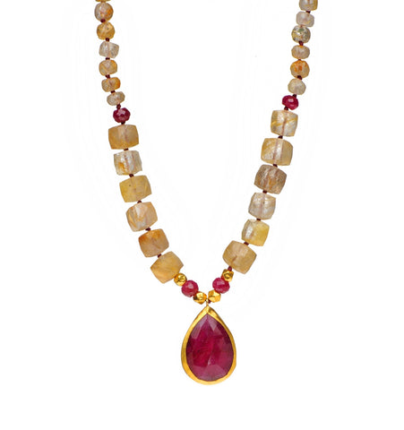 <P dir=ltr class=Body>Ruthilated Quartz Necklace and a Ruby(corundum) Drop wrapped with 24K Gold 18" Long or upon request</P>