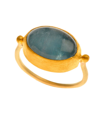 <P dir=ltr class=Body>Oval Aquamarine Gold Ring wrapped with 24K Gold Available any size! Shape and size of Stone may vary</P>