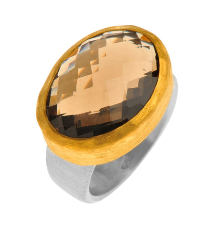 <P dir=ltr class=Body>Oval Smoky Topaz Faceted Ring wrapped with 24K Gold with a Sterling Silver Band</P>