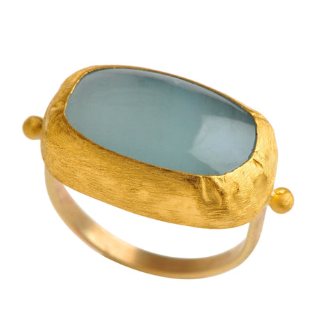 <P dir=ltr class=Body>One of A Kind Gold oval Aquamarine ring wrapped with 24k gold </P> <P dir=ltr class=Body>Measurments of stone is 14 x 21mm Available any size!</P>