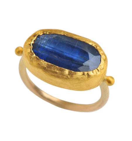 <P dir=ltr class=Body>Gold oval Kyanite Ring wrapped with 24k Gold Measurments of stone is&nbsp;19 x 12mm Available any size! Shape color and size of Kyanite may vary</P>