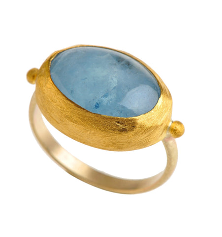 <P dir=ltr class=Body>Gold oval Aqua ring wrapped with 24k gold </P> <P dir=ltr class=Body>Measurments of stone is&nbsp;18 x 13mm Available any size! Shape color and size of Tourmaline may vary</P>