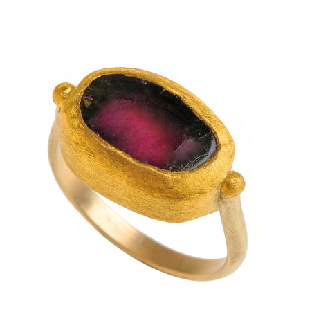 <P dir=ltr class=Body>Gold small oval Tourmaline ring wrapped with 24k gold </P> <P dir=ltr class=Body>Measurments of stone is&nbsp;15 x 10mm Available any size! Shape color and size of Tourmaline may vary</P>