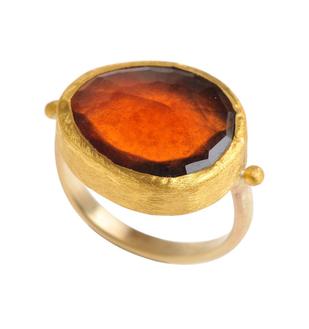 <P dir=ltr class=Body>Gold Large Hessonite Ring wrapped with 24k Gold </P> <P dir=ltr class=Body>Measurments of stone is&nbsp;20 x 17mm Available any size! Shape color and size of Hessonite may vary</P>