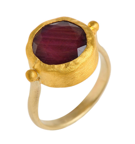 <P dir=ltr class=Body>Small round Ruby gold ring wrapped with 24k gold </P> <P dir=ltr class=Body>Measurments of stone is&nbsp;12 x 12mm Available any size! </P>