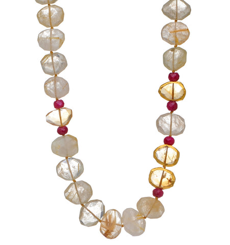 <P dir=ltr class=Body>Ruthilated Necklace and Ruby with three stones wrapped in 24K Gold 18" Long or upon request</P>