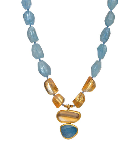 <P dir=ltr class=Body>Aquamarine and Citrine Necklace with a Double drop wrapped with 24K Gold 18" Long or upon request</P>