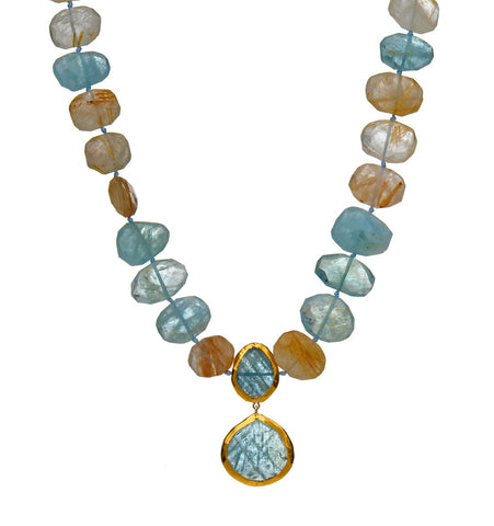 <P dir=ltr class=Body>Aquamarine and Ruthilated Quartz Necklace with a double drop of Aquamarine wrapped with 24K Gold 18" Long or upon request</P>