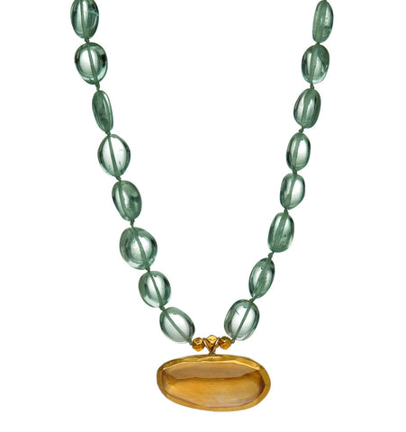 <P dir=ltr class=Body>Green Amethyst Necklace with an uneven Citrine drop wrapped with 24K Gold 18" Long or upon request</P>