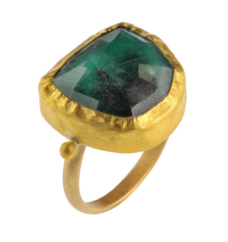 <P dir=ltr class=Body>Uneven Emerald Ring wrapped with 24K Gold on a Gold Band</P>