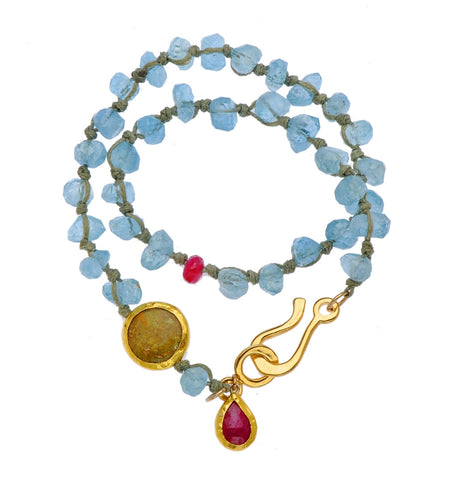 <P dir=ltr class=Body>Double wrap Aquamarine Bracelet with a Jasper and&nbsp;Ruby drops, both wrapped with 24K Gold</P>