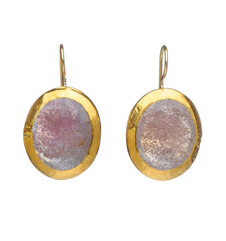 <P dir=ltr class=Body>One of a Kind Large Oval Pink Sapphire Earrings wrapped with 24K Gold Hang 30mm Width 18mm Shape color and size of Sapphire may vary!</P>