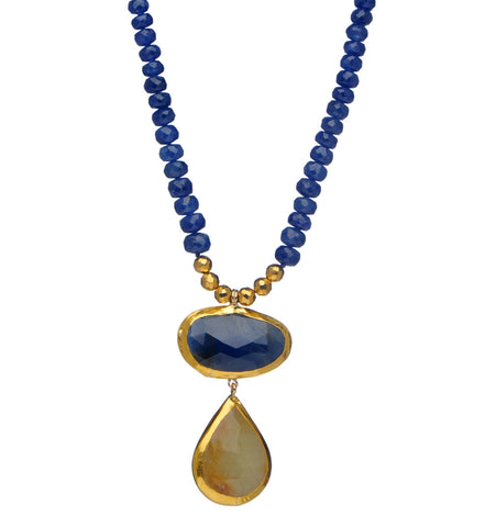 <P dir=ltr class=Body>One Of a Kind Sapphire Necklace with two drops of Sapphire all wrapped with 24K Gold 18" Long or upon request. Sapphire drops measure: Hang 40mm Width 24mm Shape, Size and Color of Sapphire may vary! </P>