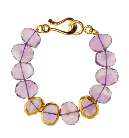 <P dir=ltr class=Body>Bracelet of Amethyst with three stones wrapped with 24K Gold 7.5" Long or upon request</P>