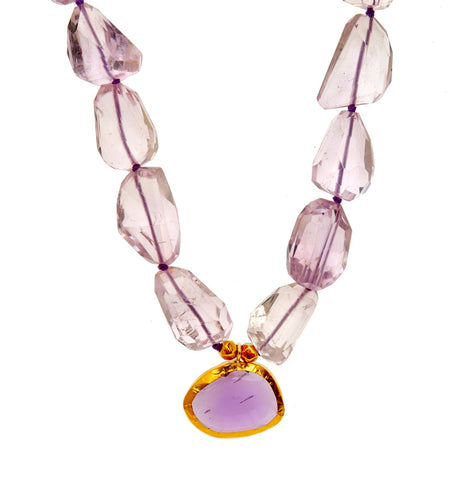 <P dir=ltr class=Body>Amethyst Nugget Necklace with an uneven shaped Amethyst drop wrapped with 24K Gold</P>