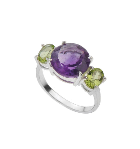 <P class=Body dir=ltr>Amethyst and Peridot Ring set in a Sterling Silver Band. Size 6.25 Only! </P>