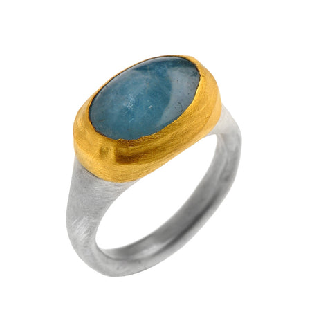 <P class=Body dir=ltr>Small Oval Aquamarine Ring wrapped with 24K Gold with Sterling Silver Band Measurments of stone is 15 x 12mm </P>