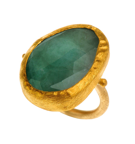 <P dir=ltr class=Body>Uneven Shaped Long Oval Emerald Ring wrapped with 24K Gold on Gold Band. Shape and Color of Emerald may vary. Available any size!</P>