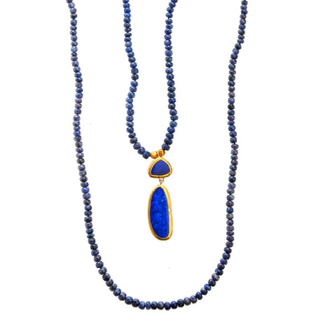 <P dir=ltr class=Body>Double strand Blue Sapphire Necklace, with 2 uneven Opal Drops wrapped with 24K Gold. Long Necklace measures 31", Short Necklace measures 20"</P>