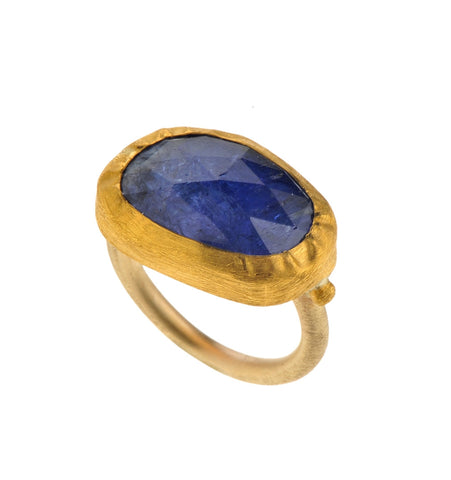 <P dir=ltr class=Body>Oval Uneven shaped Tanzanite Gold Ring, wrapped with 24K Gold Shape of Tanzanite may vary.<BR style="TEXT-TRANSFORM: none; BACKGROUND-COLOR: rgb(255,255,255); TEXT-INDENT: 0px; FONT: 11px/16px Verdana; WHITE-SPACE: normal; LETTER-SPACING: normal; COLOR: rgb(100,79,33); WORD-SPACING: 0px; -webkit-text-stroke-width: 0px"><SPAN style="TEXT-TRANSFORM: none; BACKGROUND-COLOR: rgb(255,255,255); TEXT-INDENT: 0px; DISPLAY: inline !important; FONT: 11px/16px Verdana; WHITE-SPACE: normal; FLOAT: